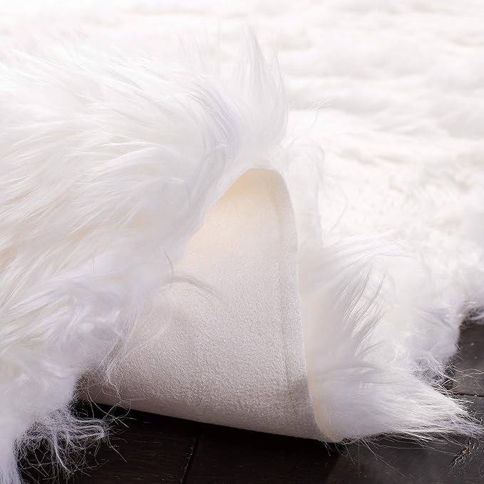 SAFAVIEH Faux Sheep Skin Collection Accent Rug - 4' x 6', Ivory, Silken Glam Design, Non-Shedding & Easy Care, 2.35-inch Thick Ideal for High Traffic Areas in Entryway, Living Room, Bedroom (FSS235A)