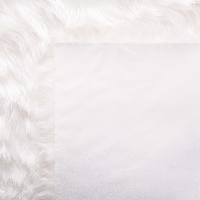 SAFAVIEH Faux Sheep Skin Collection Area Rug - 6' x 9', Ivory, Silken Glam Design, Non-Shedding & Easy Care, 2.35-inch Thick Ideal for High Traffic Areas in Living Room, Bedroom (FSS235A)