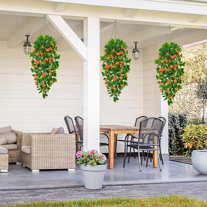 BLEUM CADE Artificial Hanging Flowers for Outdoors, 4pcs Fake Hanging Plants Pothos Vines with Orange Flowers for Wall Home Living Room Indoor Outdoor Fall Decor (No Baskets)