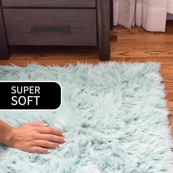 Super Area Rugs Ultra Soft & Fluffy Faux Sheepskin Rug, Teal 2 x 4 Feet Sheepskin Carpet for Bedroom Living Room